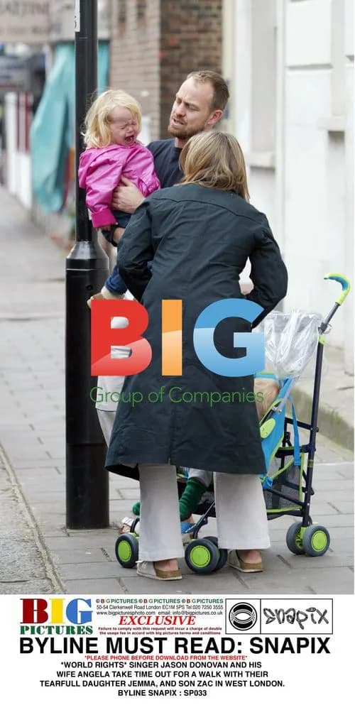 Jason Donovan and family out for walk in London