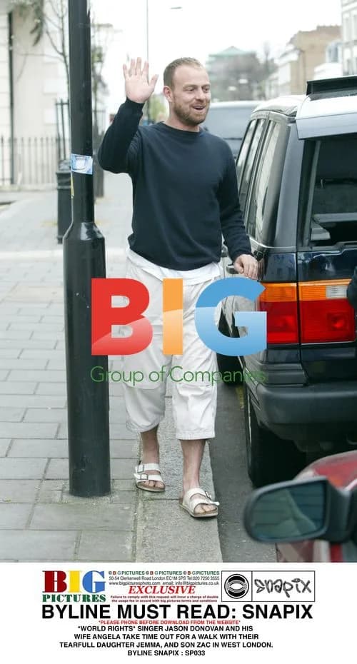 Jason Donovan and Family Take Walk in London