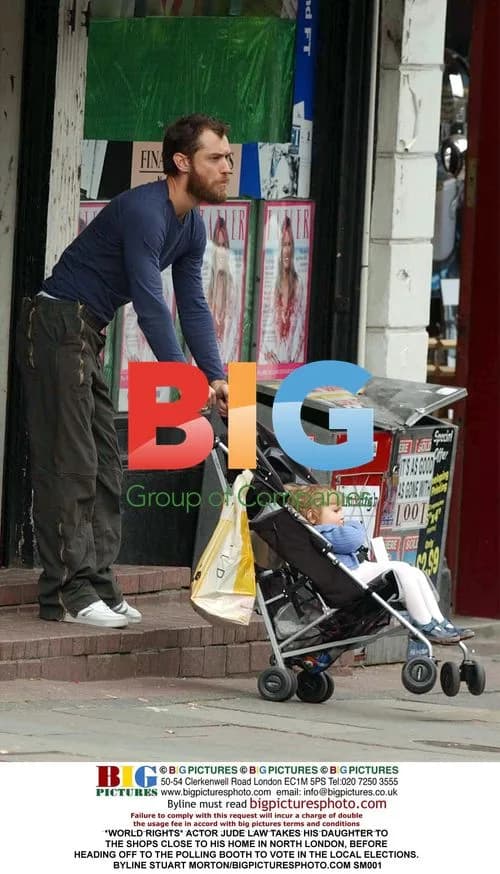 Jude Law takes daughter shopping before voting