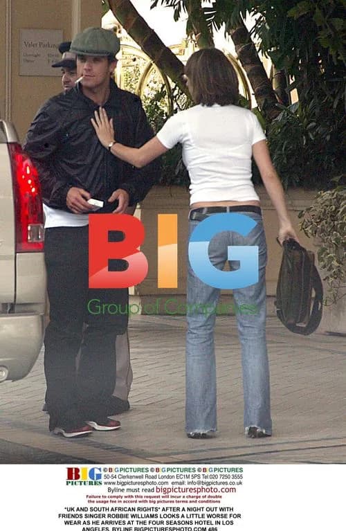 Robbie Williams Arriving at Four Seasons Hotel