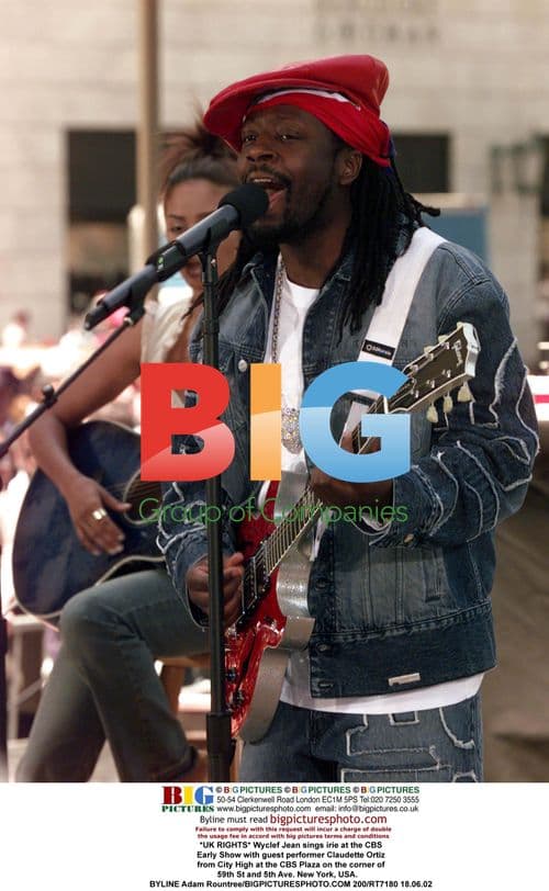 Wyclef Jean and Claudette Ortiz perform at CBS Early Show