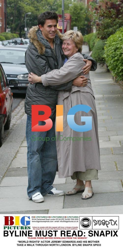 Jeremy Edwards and mother walk in North London