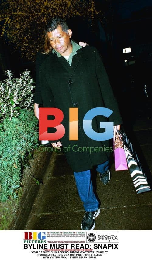 Liz Hurley on Shopping Trip with Mystery Man