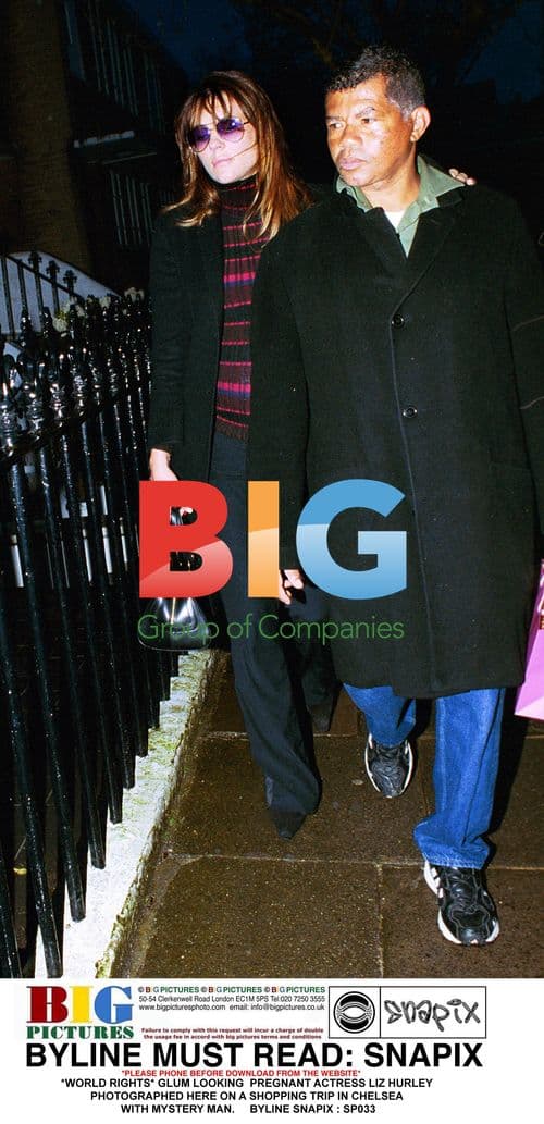 Liz Hurley on Shopping Trip with Mystery Man