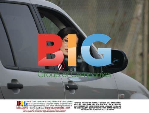 Kym Marsh and her children in her new car