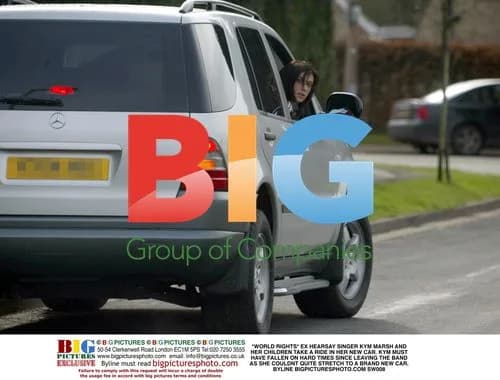 Kym Marsh and kids in new car