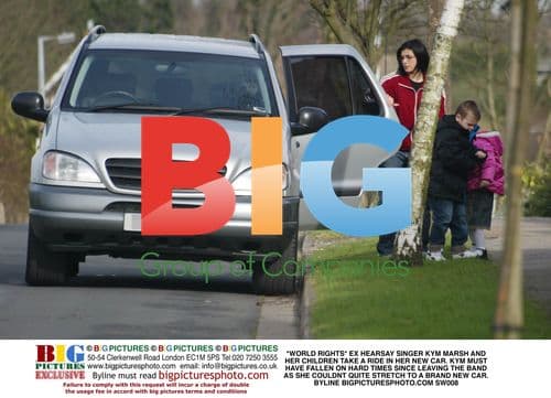 Kym Marsh and children in new car