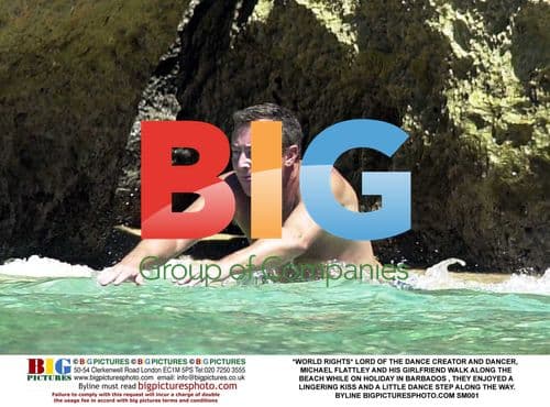 Michael Flattley and Girlfriend on Beach in Barbados