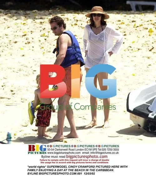 Cindy Crawford Relaxes on Caribbean Beach