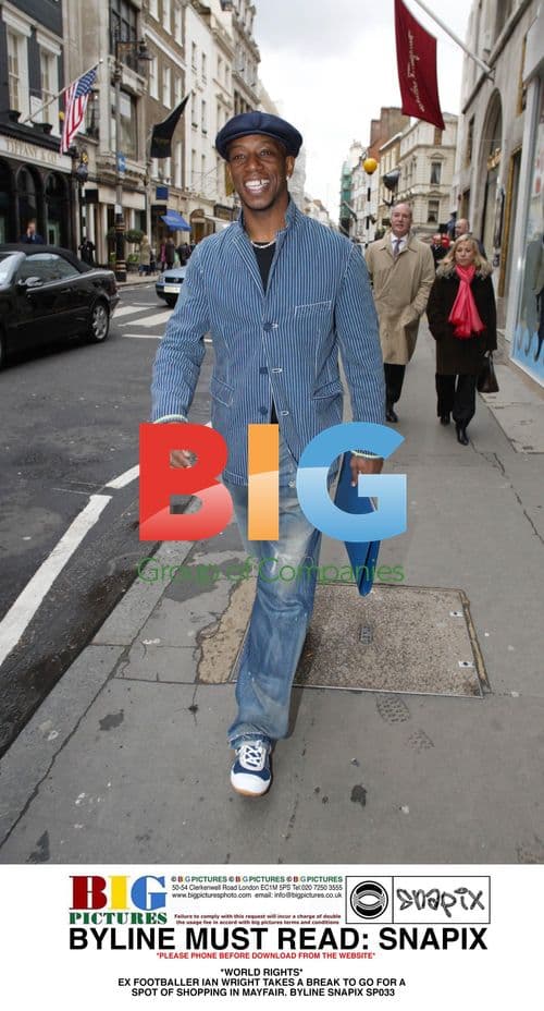 Ian Wright Shopping in Mayfair