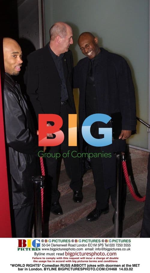 Russ Abbott jokes with doormen at MET bar in London