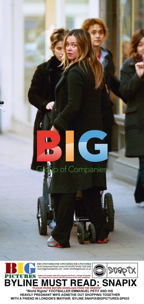 Footballer Emmanuel Petit and Pregnant Wife Agnethe Shop in London