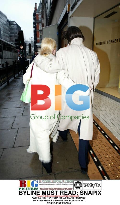 Fiona Phillips and husband shopping