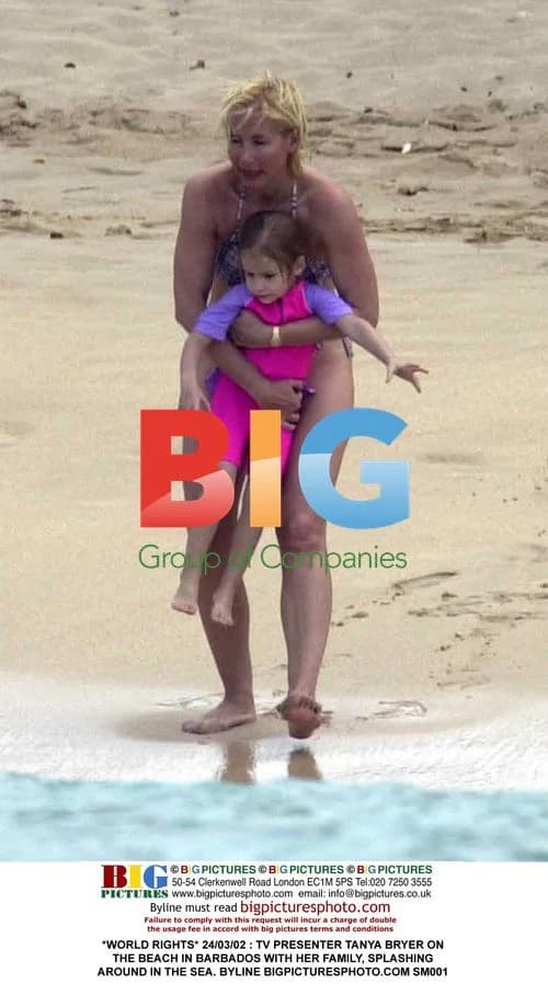 Tanya Bryer on Barbados beach with family