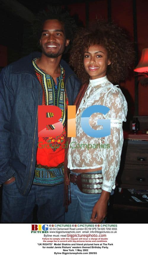 Shakira and friend at western themed party