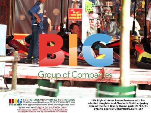 Pierce Brosnan and daughter at Disneyland