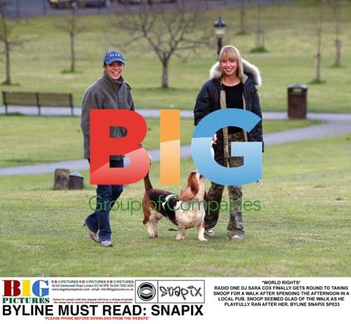 SARA COX TAKES SNOOP FOR A WALK