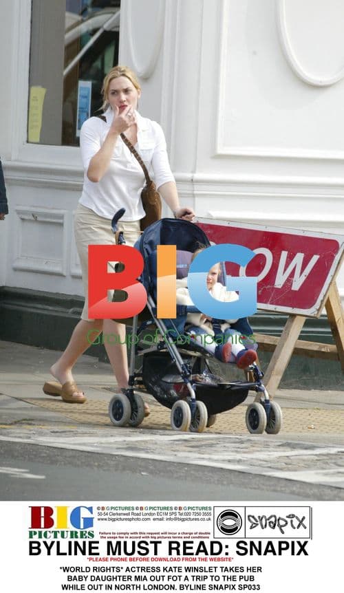 Kate Winslet out with baby Mia in North London