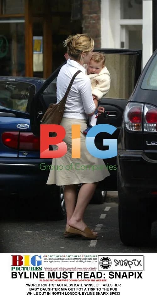Kate Winslet out with baby Mia in London