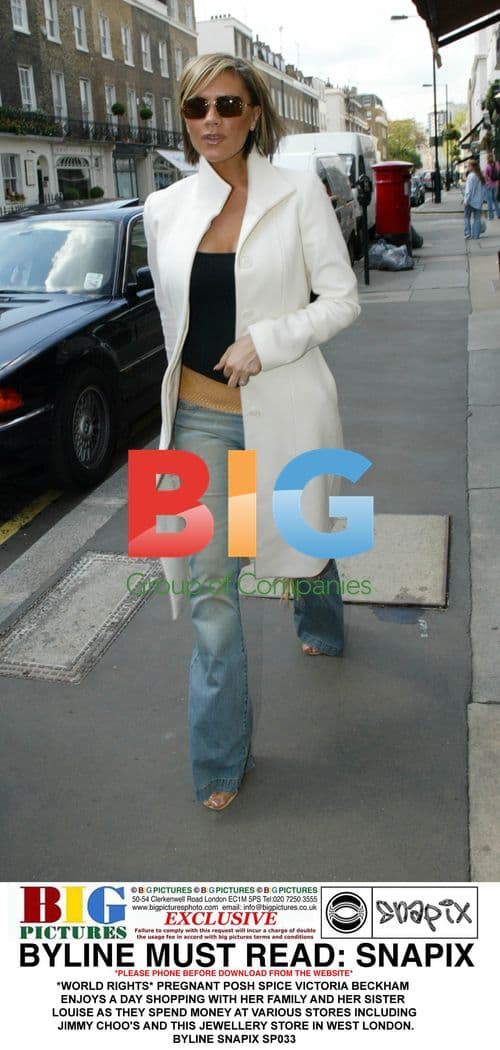 Pregnant Victoria Beckham shops with family