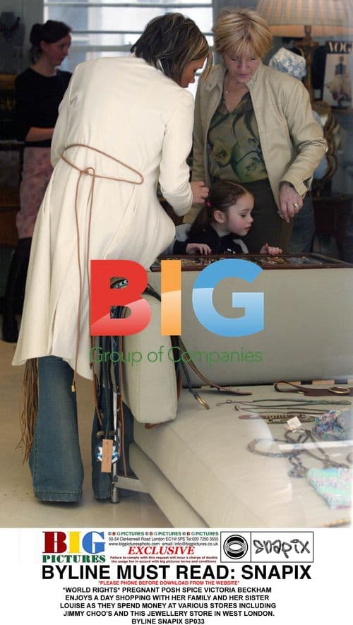 Pregnant Victoria Beckham shopping with family