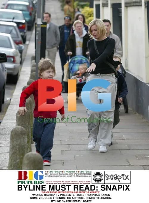 TV Presenter Kate Thornton Takes Friends for Stroll