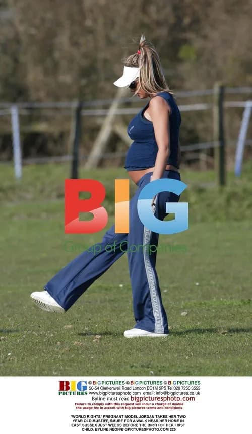 Pregnant Jordan takes dog for walk