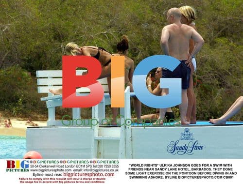 Ulrika Johnson swims with friends in Barbados