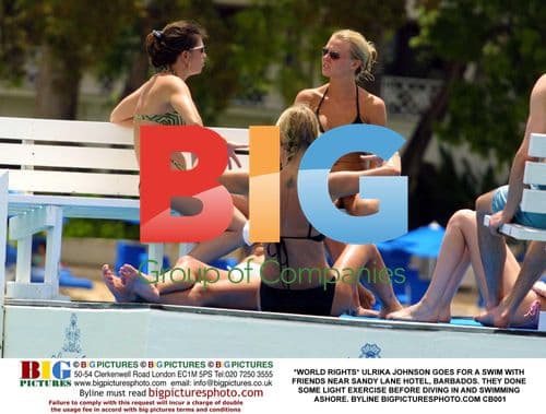 Ulrika Johnson swims with friends in Barbados