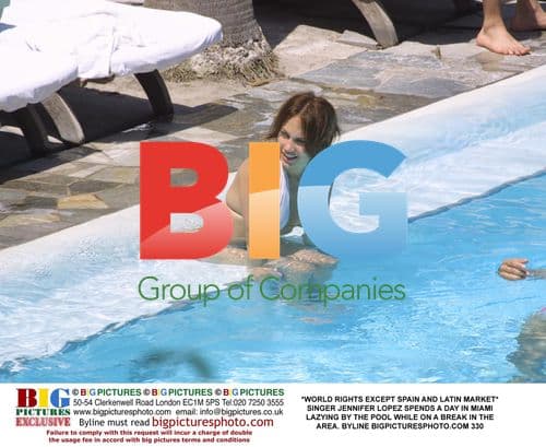 Jennifer Lopez Relaxes by Miami Pool