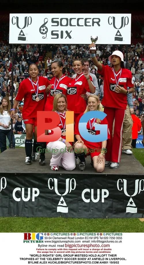 Girl group Misteeq hold trophies at soccer event