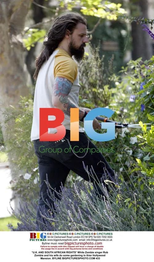 Rob Zombie Gardening with Wife