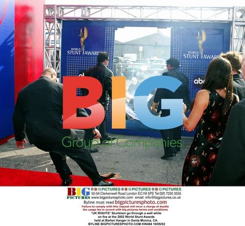 Stuntmen go through flaming wall at 2002 World Stunt Awards