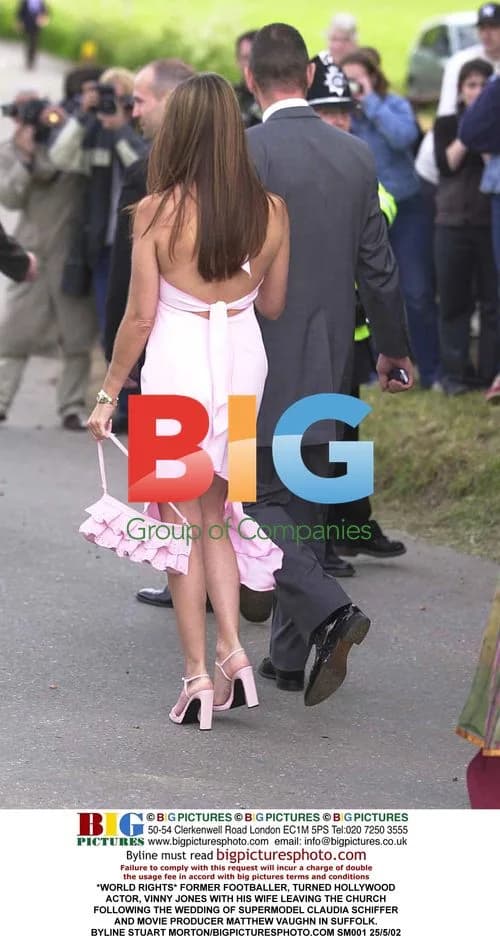 Vinny Jones with wife leaving Schiffer-Vaughn wedding