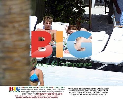 Jennifer Lopez Relaxes by Miami Pool