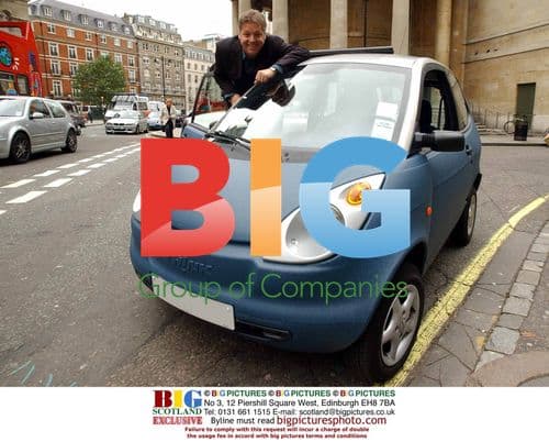 RADIO 1 DJ MARK GOODIER WITH ELECTRIC CAR