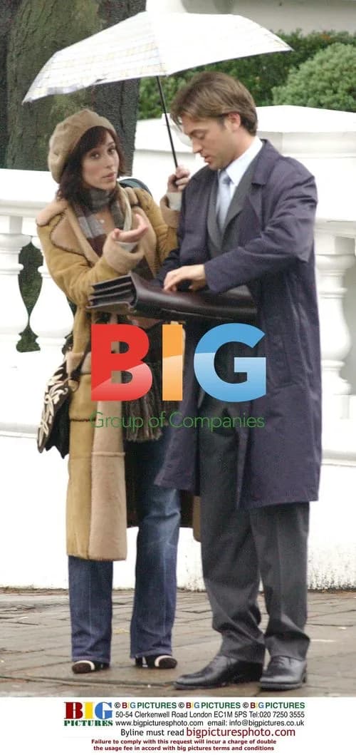Jenifer Love Hewitt and Paul Nichols walking in London