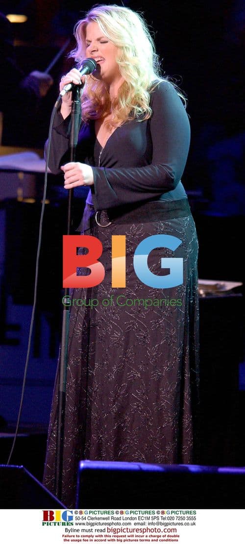 Trisha Yearwood performs at Stormy Weather Benefit