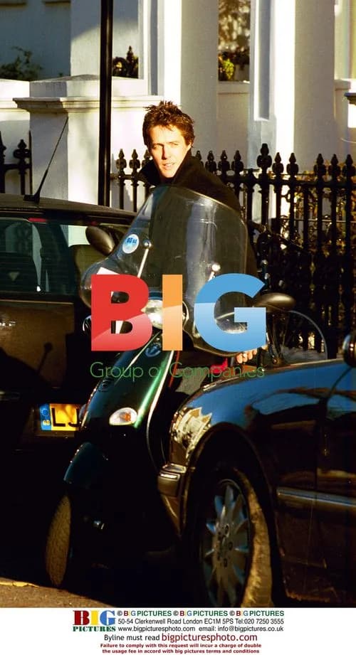 Hugh Grant getting newspapers in London