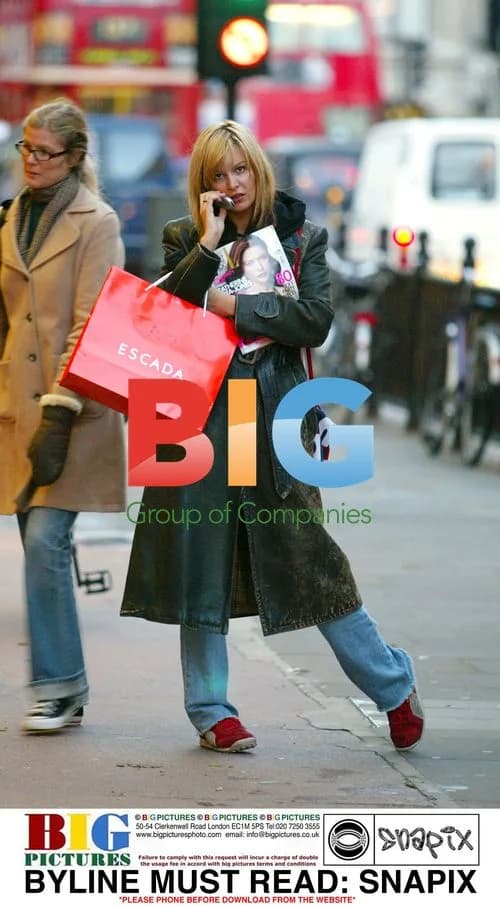 Catalina Guirado Waits for Bus in Knightsbridge