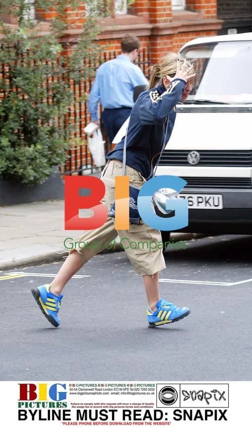 Natalie Appleton Hides from Paparazzi