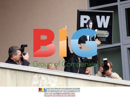 Robbie Williams Celebrates Gold Albums in Berlin