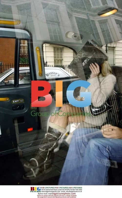 Amanda Holden Hides in Taxi