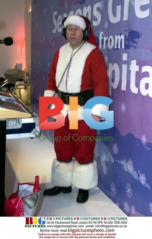 DJ Dr. Fox Hosts Show as Santa in Store Window