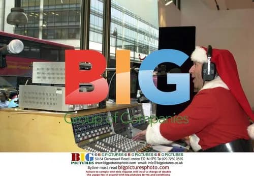 Radio DJ Dr. Fox Broadcasts as Santa