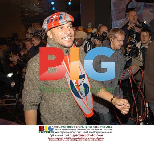 Actress X posing on red carpet