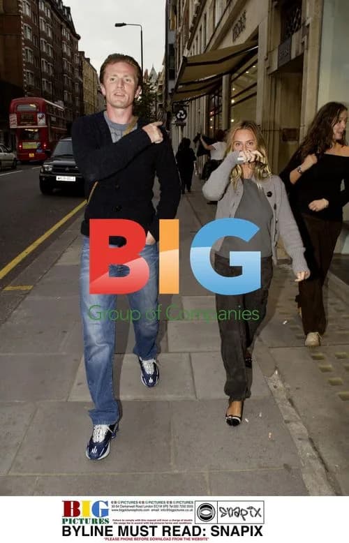 Emmanuel Petit with wife Agathe out shopping
