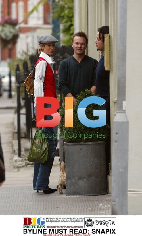 Lady Victoria Hervey walks with dog