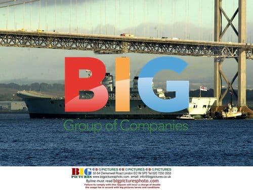 Aircraft Carrier 'Illustrious' Passes Under Bridges