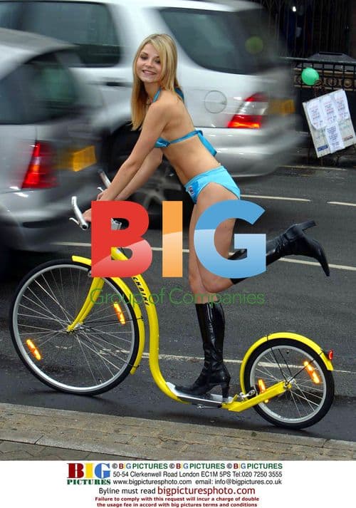 Nickie Theobald Poses on Scooter